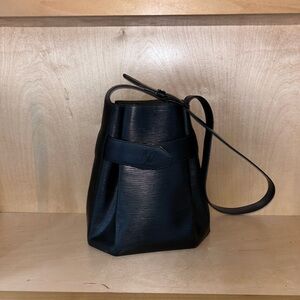 Louis Vuitton
Epi Leather Sac d'Epaule PM
Estimated Retail Price of $1,600
